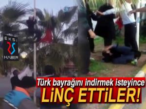 Türk bayrağını indirmek isteyince linç edilmek istendi