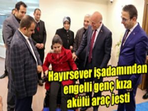 Hayırsever işadamından engelli genç kıza akülü araç jesti