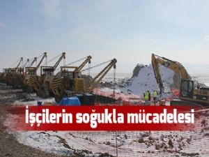  İşçilerin soğukla mücadelesi