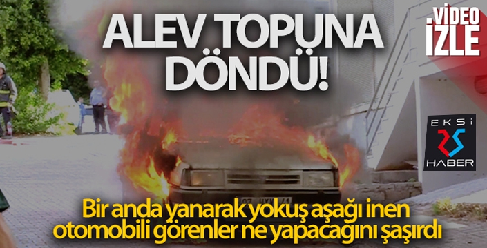 Alev topuna dönen otomobilin freni boşalınca panik yaşandı