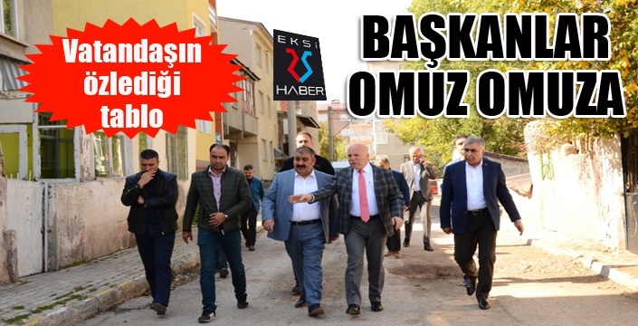 İki başkan omuz omuza