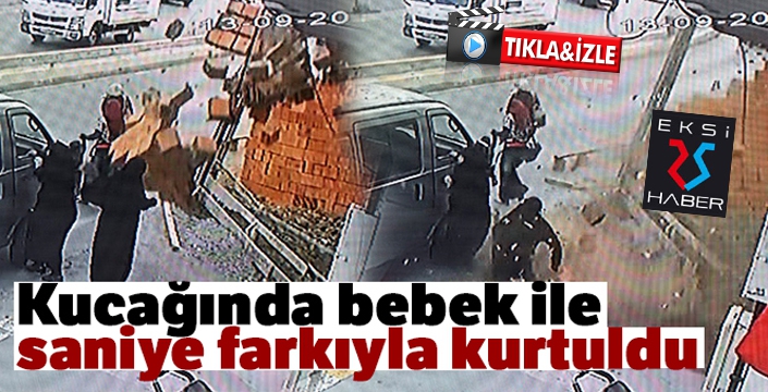 Kucağında bebek ile saniye farkıyla kurtuldu