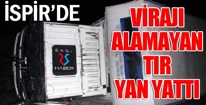 Virajı alamayan TIR yan yattı